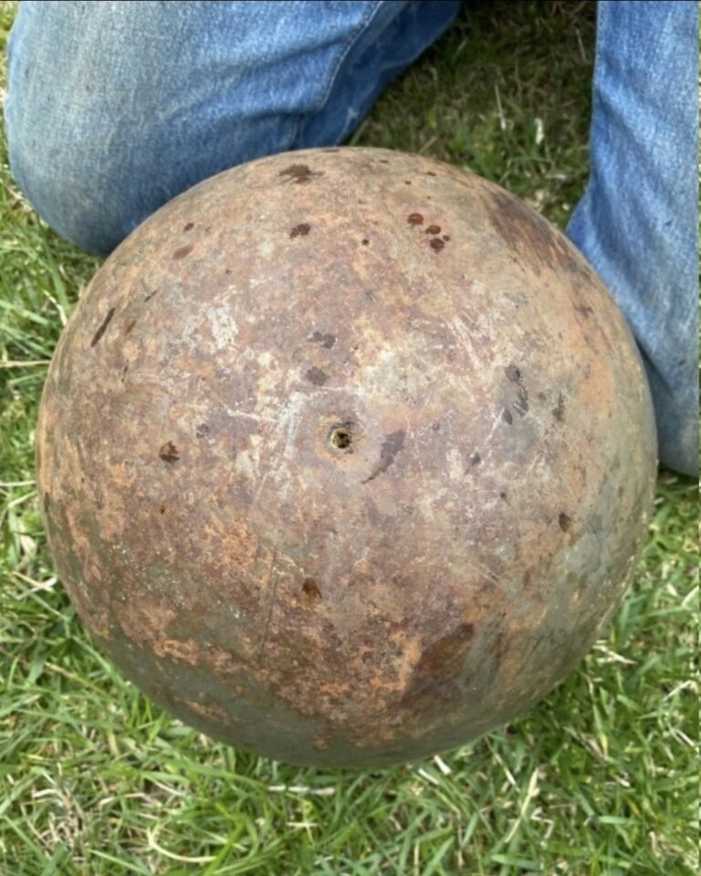 Found a giant ~150 lb. steel ball in a creek near my house. It has tiny boreholes and leaked black liquid when we rolled it around.